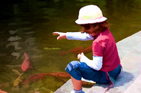 Girl Feeding Fish